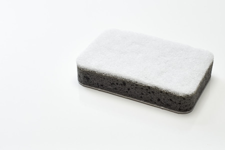 close up of dish washing sponge on white background with clipping pathの写真素材