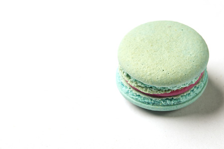 Sweet and colourful french macaroons or macaron on white background, Minimal Dessertの写真素材