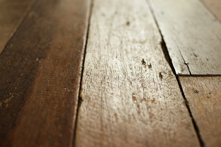 Low angle view of a rustic pillar architectural feature in the dining area of a home viewed acrossの写真素材