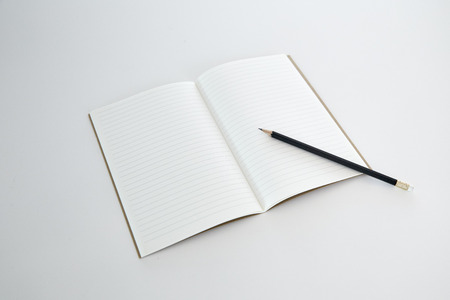 Blank notebook with pencil, empty space, minimal concept