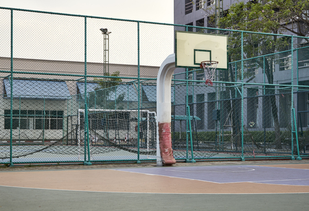 white plate of basketball hoop standing outdoor in a community park  free sport and healthy infrastructure conceptのeditorial素材