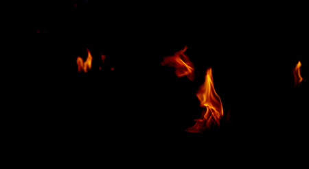 Fire flames on a black backgroundの写真素材