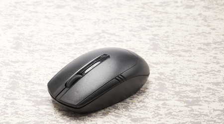 wireless black computer mouse on the desk, Coordination Ideasの写真素材