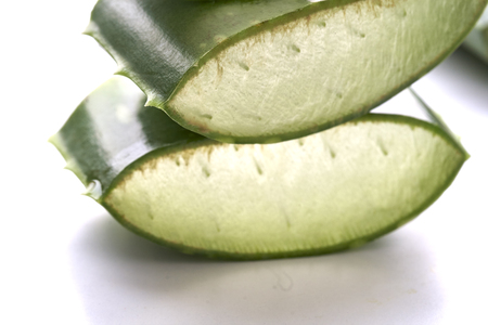 Closeup of aloe vera slice on white backgroundの写真素材