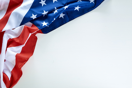 Flag of the USA on white wooden backgroundの写真素材