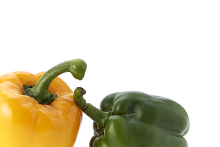 Colorful bell pepper vegetable isolated on white background ,minimal top view with copy space. Linear arrangement.の写真素材