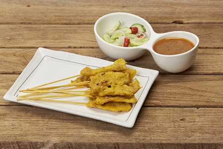 Grilled pork satay with peanut sauce and toast, Thai foodの写真素材