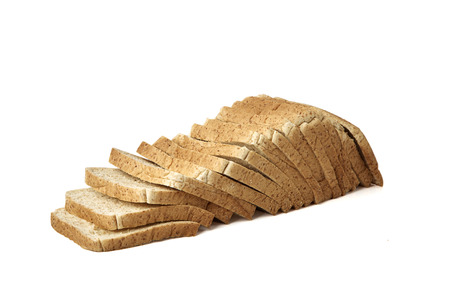 slices of whole wheat bread isolated on white backgroundの写真素材