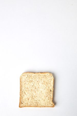 slices of whole wheat bread isolated on white background