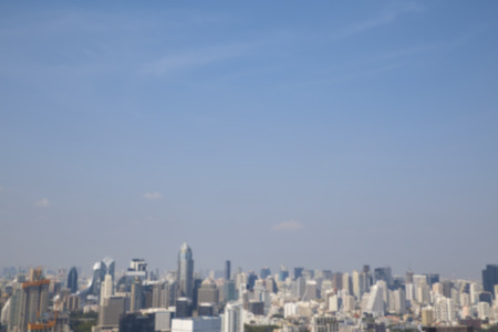 Blur background of morning gold light view over cityscape Bangkok
