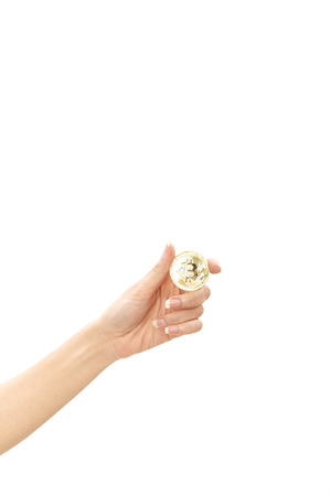Cropped shot of woman holding bitcoin on white background, Financial Exchange Conceptsの写真素材