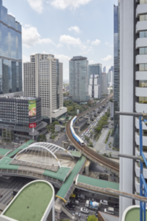 Blur background of morning gold light view over cityscape Bangkokの写真素材