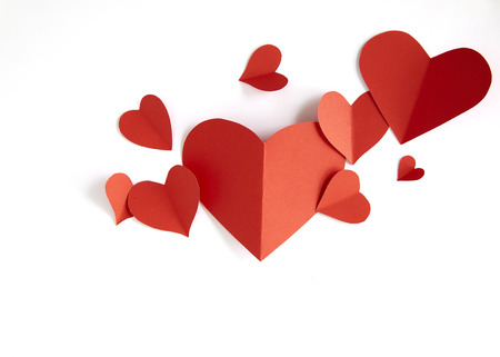 Red paper hearts isolated on white background, copy spaceの写真素材