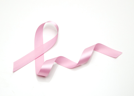 Pink breast cancer ribbon isolated on white backgroundの写真素材
