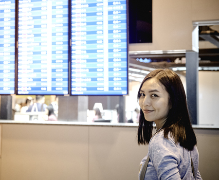 Asian woman travel at airport terminal.の写真素材