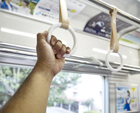 Train strap . Scenery inside the train in japanの写真素材