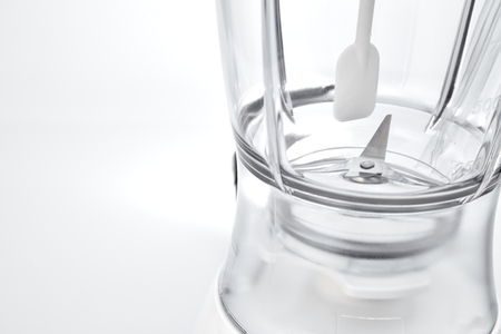 Blender - Empty white electric juice blender on a white backgroundの写真素材