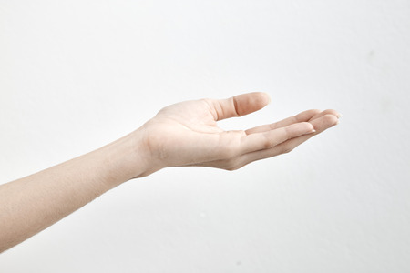 Close-up of beautiful Female hand isolated on white background, Technology Concepts with Businessの写真素材