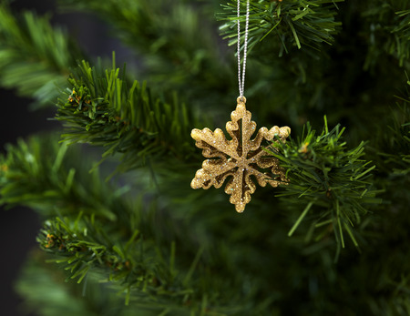 Christmas tree decoration ball star gold on abstract  background for Happy new year.の写真素材