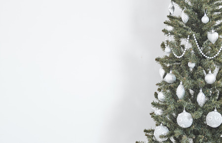 Silver Christmas balls on the Christmas tree in the new year 2019