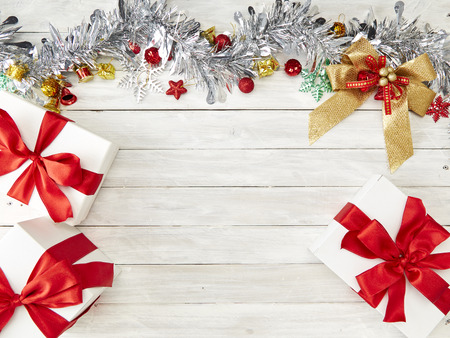 Happy New Year 2019 and Christmas on white wooden background with decoration, gift box, Star shape, baubles and pine tree branches board background,Holidays banner, Flat lay, Top view and Copy Space for your textの写真素材