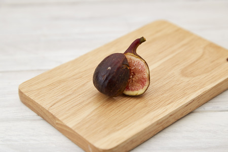 fresh fig on white wooden table or background. Healthy snack and food. Brogiotto Nero Figの写真素材