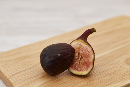 fresh fig on white wooden table or background. Healthy snack and food. Brogiotto Nero Figの写真素材