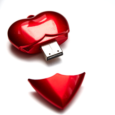 Red Heart shape love flash drive valentines day  festival, The concept of happy memoriesの写真素材