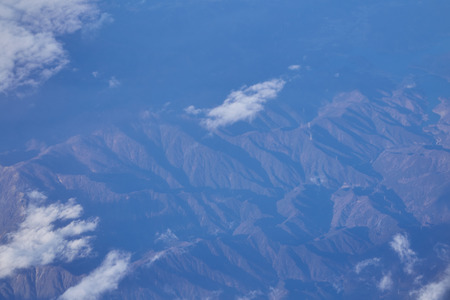 Beautiful blue sky and white cloud and landscape view from the plane in Japanの写真素材