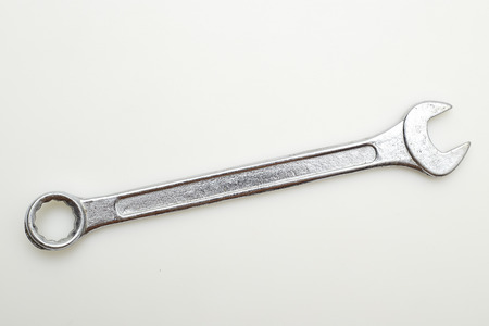 Stainless steel wrench coated with chrome with white blackground, Labor Day, Empty space for...