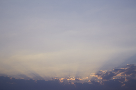 Red sunset with clouds and evening sunshineの写真素材