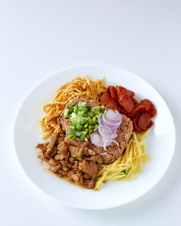Thai traditional food Rice Mixed with Shrimp paste on white background, khao kluk kapiの写真素材
