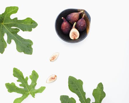 Fresh sliced fresh figs on white background . Figs collectionの写真素材