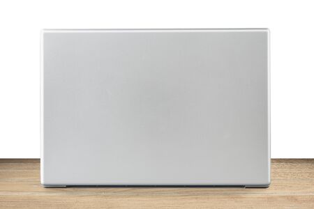 back of laptop is on the wooden background, Technology conceptの写真素材