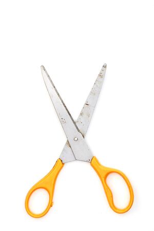 Close-up Top view Yello Scissors on a white backgroundの写真素材