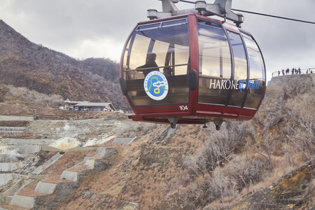 Hakone, Japan - Jan 18, 2019: Hakone ropeway cable car travelling in Owakudani valley at Hakone,...