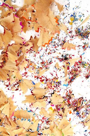 Shavings from multicolored pencils on white background, Education, Back to school Concept.の写真素材
