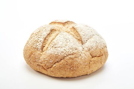 Traditional homemade french round bread on a white backgroundの写真素材