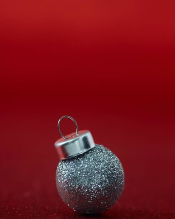 Christmas decorations Silver ball isolated on red background, copy space for textの写真素材