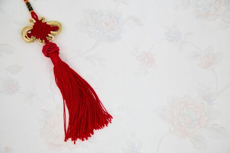 Chinese new year ornament good luck symbol, Chinese red Knot on wallpaperの写真素材