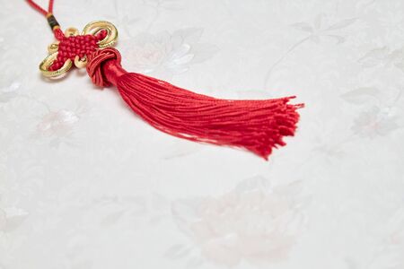 Chinese new year ornament good luck symbol, Chinese red Knot on wallpaperの写真素材