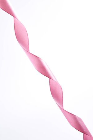 Flat lay Pink curly ribbon isolated on white backgroundの写真素材