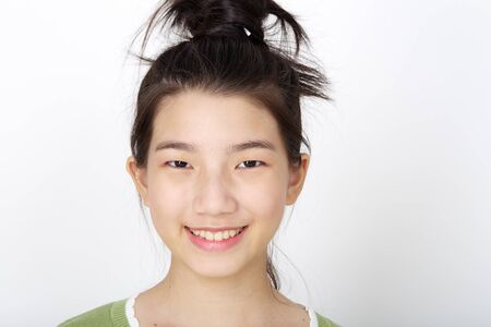 Young Asian pretty education woman close up portrait on white backgroundの写真素材