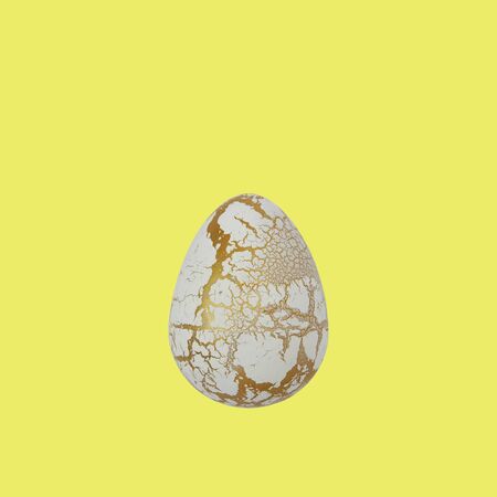 Easter egg isolated on a yellow background, copy space for text