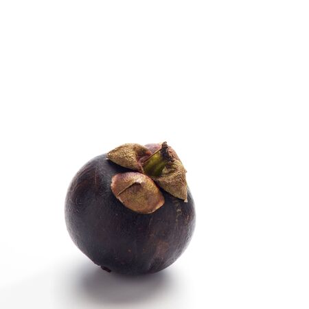 Asian fruit, ripe mangosteen fruit isolated on white background.の写真素材