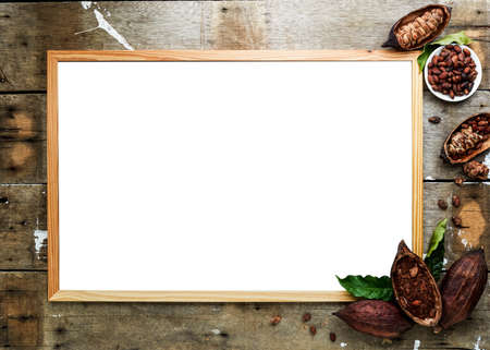 Mug of cacao Hot drink with cocoa pods, cacao powder, cacao beans, on a white background, flat lay...