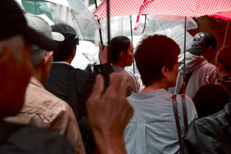TOKYO JAPAN, Sep 21 ,2018, People holding umbrellas the street in the city, Tokyo in Japanのeditorial素材