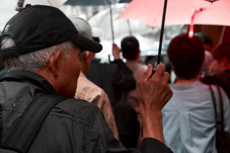 TOKYO JAPAN, Sep 21 ,2018, People holding umbrellas the street in the city, Tokyo in Japanのeditorial素材