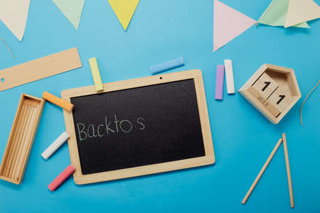 Top view black board on blue background, School Conceptの写真素材