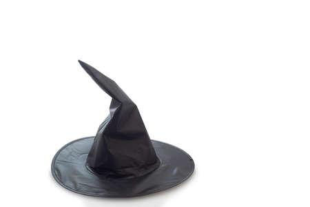 Witch or Wizard hat decorated, Black pointed cone shaped witch hat isolated on white backgroundの写真素材